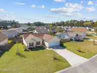 1966 Jeffrey Stokes Drive NE, Leland, NC 28451 — 3-bedroom home in Eastbrook, Leland, NC, photo 5 of 48: 5-web-or-mls-DJI_20260327152615_0272_D