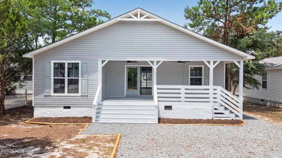 137 NE 31st Street, Oak Island, NC 28465 — 3-bedroom home, Oak Island, NC, photo 1 of 50