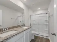 5791 Harebell Road Unit 150, Leland, NC 28451 — 4-bedroom townhome in SeaBrooke, Leland, NC, photo 21 of 51: 21 Primary bathroom