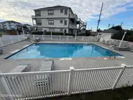 2802 Pier Pointe Drive, Emerald Isle, NC 28594 — 2-bedroom condo in Pier Pointe, Emerald Isle, NC, photo 2 of 28: 20251203_201336902_iOS