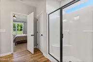 9001 Fox Trot Circle, Middlesex, NC 27557 — 3-bedroom home in Beaver Creek, Middlesex, NC, photo 15 of 33: 15-Walk In Shower Primary Bath