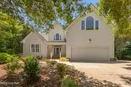 573 Coral Ridge Road, Pine Knoll Shores, NC 28512 — 4-bedroom waterfront home in Beacon's Reach, Pine Knoll Shores, NC, photo 1 of 59: Stunning Pine Knoll Shores home