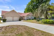 995 Chadwick Shores Drive, Sneads Ferry, NC 28460 — 4-bedroom waterfront home in Chadwick Shores, Sneads Ferry, NC, photo 2 of 69: 4_front exterior