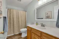 7115 Brittany Lakes Drive, Wilmington, NC 28411 — 4-bedroom waterfront home in Brittany Lakes, Wilmington, NC, photo 17 of 37