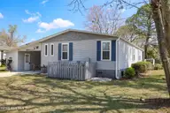 719 Nautical Court, Hampstead, NC 28443 — 2-bedroom manufactured home in Topsail Greens, Hampstead, NC, photo 1 of 58: 337565D1-21DA-45B0-AAF2-AA307D4C5A79