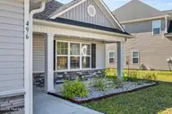 496 Pebble Shore Drive, Sneads Ferry, NC 28460 — 3-bedroom home in The Landing at Mill Creek, Sneads Ferry, NC, photo 5 of 48: 5_front porch
