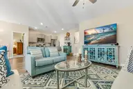 1728 Culdees Lane SE, Bolivia, NC 28422 — 3-bedroom home in Avalon, Bolivia, NC, photo 23 of 57: living room towards kitchen