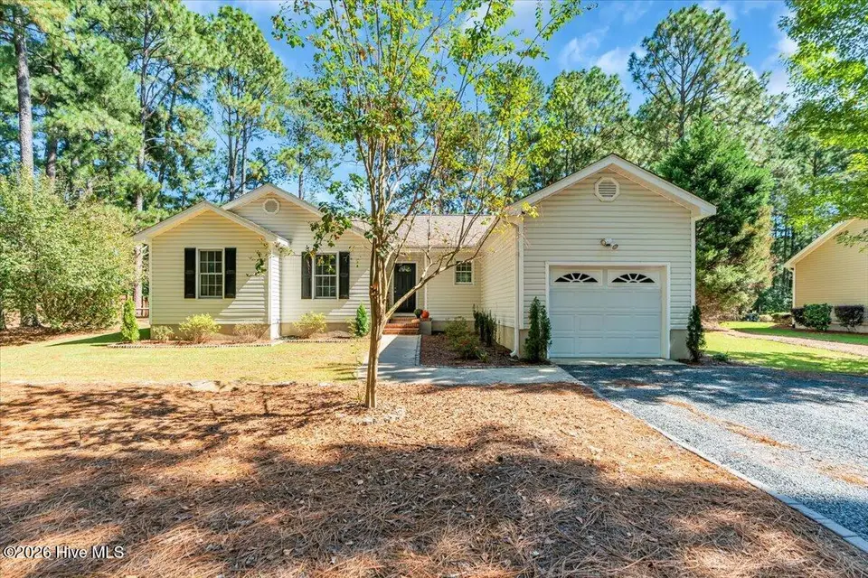 145 Laurel Oak Lane, Pinebluff, NC 28373 — 3-bedroom home in The Pines, Pinebluff, NC, photo 1 of 38: Front of House