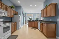 1013 Meadowlands Trail NW, Calabash, NC 28467 — 4-bedroom home in Meadowlands, Calabash, NC, photo 13 of 41: Eat-In Kitchen