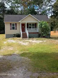 285 Walnut Road, Southport, NC 28461 — 3-bedroom home in Boiling Spring Lakes, Southport, NC, photo 1 of 12: Front 285
