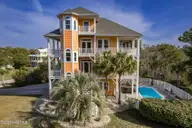 200 Shipwreck Lane, Emerald Isle, NC 28594 — 3-bedroom waterfront home in Spinnakers Reach, Emerald Isle, NC, photo 1 of 59: Emerald Isle home with pool