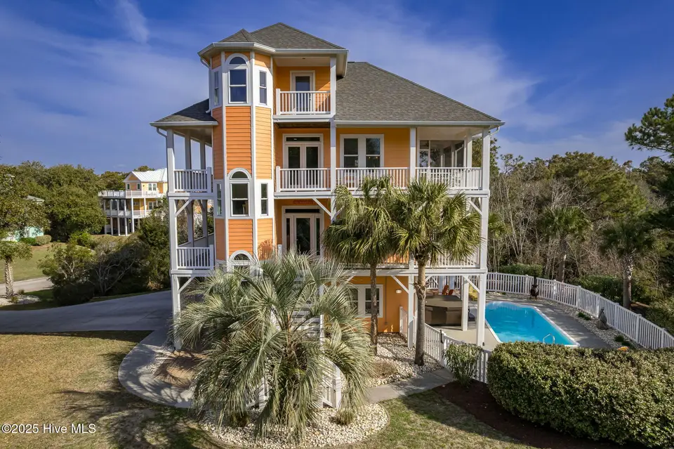 200 Shipwreck Lane, Emerald Isle, NC 28594 — 3-bedroom waterfront home in Spinnakers Reach, Emerald Isle, NC, photo 1 of 59: Emerald Isle home with pool