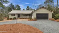 102 Scuppernong Court, West End, NC 27376 — 3-bedroom home in Seven Lakes North, West End, NC, photo 1 of 42: Front