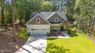102 Dartmoor Lane, Seven Lakes, NC 27376 — 4-bedroom waterfront home in Seven Lakes South, Seven Lakes, NC, photo 1 of 58: 8-web-or-mls-DJI_20250809105325_0510_D