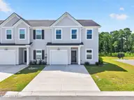 1215 Windy Grove Lane SW, Ocean Isle Beach, NC 28469 — 4-bedroom townhome in Cameron Woods, Ocean Isle Beach, NC, photo 1 of 57