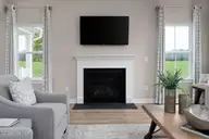 131 Harmonica Lane, Greenville, NC 27834 — 4-bedroom home in Carolina Crofts, Greenville, NC, photo 13 of 29: 12 living room