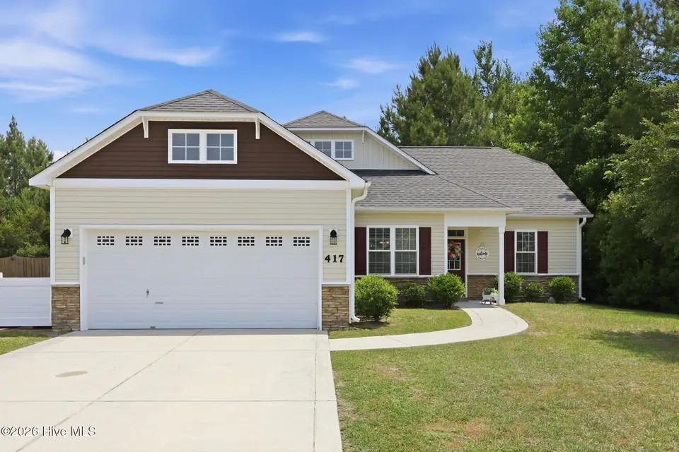 417 Cyrus Thompson Drive, Jacksonville, NC 28546 — 3-bedroom home in Towne Pointe, Jacksonville, NC, photo 1 of 50