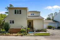 300 Mcginnis Drive, Pine Knoll Shores, NC 28512 — 3-bedroom waterfront condo in Mcginnis Point, Pine Knoll Shores, NC, photo 2 of 57: Front Elevation