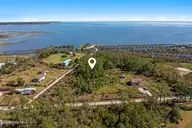 166 Fulcher Landing Drive, Stacy, NC 28581 — waterfront lot, Stacy, NC, photo 2 of 22: Waterfront vacant lot in Stacy