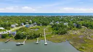 9806 27 Clarendon Drive, Emerald Isle, NC 28594 — waterfront lot in Royall Oaks, Emerald Isle, NC, photo 2 of 31: 28-web-or-mls-DJI_20260519143343_0864_D