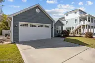 129 NW 11th Street, Oak Island, NC 28465 — 3-bedroom home in Pinners Point, Oak Island, NC, photo 2 of 63: FRONT
