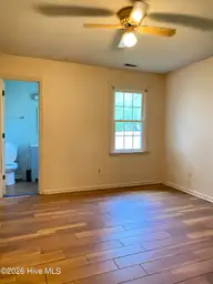 234 Cedar Creek Drive, Jacksonville, NC 28540 — 2-bedroom townhome in Cedar Creek, Jacksonville, NC, photo 5 of 15: 7 bedroom primary 234 Cedar Creek Dr Jac