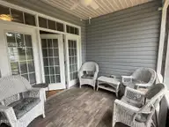 5069 Wyncie Wynd, Southport, NC 28461 — 2-bedroom condo in South Harbour Village, Southport, NC, photo 16 of 24: Rear porch