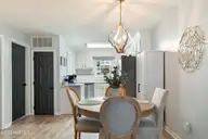 505 N Carolina Beach Avenue Unit 1c, Carolina Beach, NC 28428 — 2-bedroom waterfront condo in Winds at Carolina Beach, Carolina Beach, NC, photo 7 of 44: Dining Room 1