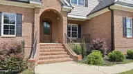 1453 Blue Heron Drive, Nashville, NC 27856 — 3-bedroom waterfront home in The Landing at Cooper Fields, Nashville, NC, photo 6 of 59: 5-web-or-mls-DJI_20260708152307_0584_D