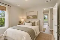 5256 Soybean Drive NE, Winnabow, NC 28479 — 3-bedroom home in Country Walk, Winnabow, NC, photo 6 of 43: Calm Coastal Guest Bedroom