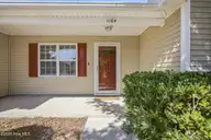 1104 Crestfield Way, Leland, NC 28451 — 3-bedroom home in Windsor Park, Leland, NC, photo 3 of 49: Oversized Front Porch