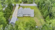 2703 E Fairway Road, Morehead City, NC 28557 — 3-bedroom home in Country Club East, Morehead City, NC, photo 9 of 71: 7-web-or-mls-2703-E-Fairway-DRONE-6-29-2