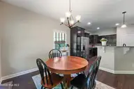 134 Mittams Point Drive, Jacksonville, NC 28546 — 3-bedroom home in Towne Pointe, Jacksonville, NC, photo 22 of 40: DINING ROOM FROM PATIO DOOR