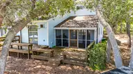 142 Lagoon Lane, Pine Knoll Shores, NC 28512 — 3-bedroom waterfront condo in Mcginnis Point, Pine Knoll Shores, NC, photo 4 of 41: Porch and Decks for Water Views