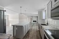 6812 Lewis Drive SE, Winnabow, NC 28479 — 3-bedroom manufactured home in Lewis Acres, Winnabow, NC, photo 12 of 27: Kitchen