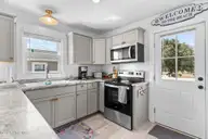 920 E Pelican Drive, Oak Island, NC 28465 — 3-bedroom waterfront home in E. Long Beach, Oak Island, NC, photo 7 of 46: 7-web-or-mls-BTS02452