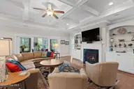 2585 Parkridge Drive, Southport, NC 28461 — 4-bedroom waterfront home in St James, Southport, NC, photo 13 of 77: FP is temp controlled | Heat producing