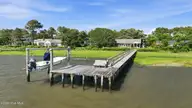 221 Rudolph Drive, Beaufort, NC 28516 — 3-bedroom waterfront home in Deerfield Shores, Beaufort, NC, photo 2 of 59: 47-web-or-mls-DJI_20260521154046_0019_D