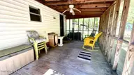 648 Old Church Road, Swansboro, NC 28584 — 3-bedroom manufactured home in Cedar Creek Est, Swansboro, NC, photo 18 of 37: screened porch