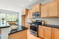 128 Wembley Drive, Clayton, NC 27527 — 3-bedroom townhome in Flowers Plantation, Clayton, NC, photo 8 of 22: kitchen