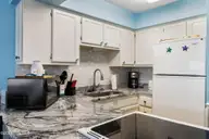 1311 Lake Park Boulevard S 2b, Carolina Beach, NC 28428 — 1-bedroom waterfront condo in Sea Colony, Carolina Beach, NC, photo 13 of 42: KItchen
