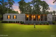 101 Lake Vue Drive, Aurora, NC 27806 — 2-bedroom waterfront manufactured home in Isle Vue Beach, Aurora, NC, photo 1 of 55: BDE57131-63CA-4FD2-A0B5-17D9F9D6D044
