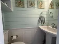 283 Salter Path Road 115, Pine Knoll Shores, NC 28512 — 2-bedroom waterfront condo in Pine Knoll Townes, Pine Knoll Shores, NC, photo 7 of 15: Half Bath
