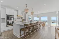 2205 E Beach Drive, Oak Island, NC 28465 — 6-bedroom waterfront home in Long Beach, Oak Island, NC, photo 10 of 55