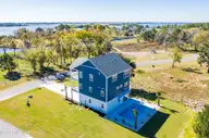 600 Salt Grass Court, Holly Ridge, NC 28445 — 4-bedroom waterfront home in Redd's Cove, Holly Ridge, NC, photo 3 of 52: DJI_0161