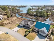 643 Riva Ridge Road, Sneads Ferry, NC 28460 — 3-bedroom waterfront home in Escoba Bay, Sneads Ferry, NC, photo 2 of 57: 35-web-or-mls-643 Riva Ridge Rd 87