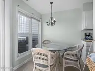 8713 Plantation Drive 402, Emerald Isle, NC 28594 — 3-bedroom waterfront townhome in Emerald Plantation, Emerald Isle, NC, photo 16 of 68: Dining Area