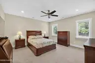 460 Summerhouse Drive, Holly Ridge, NC 28445 — 4-bedroom home in Summerhouse On Everett Bay, Holly Ridge, NC, photo 12 of 73: primary bedroom