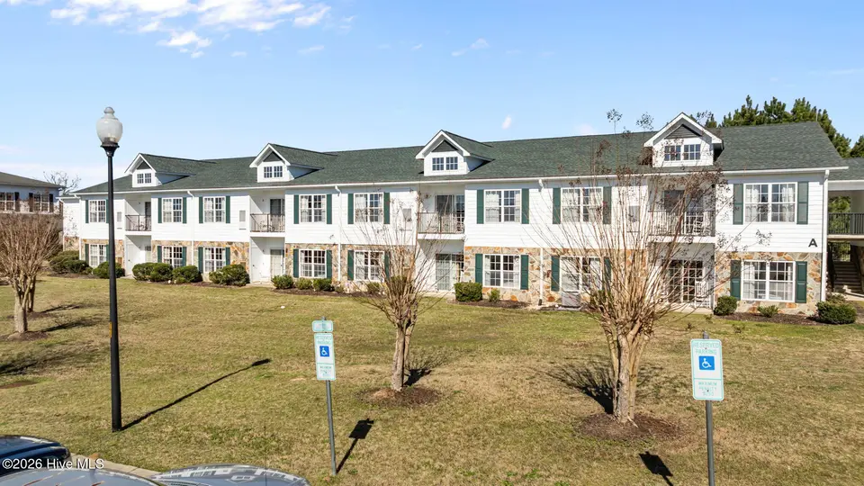 510 Little River Farm Boulevard 106b, Carthage, NC 28327 — 2-bedroom condo in Little River Fa, Carthage, NC, photo 1 of 22: Porch side of condo units