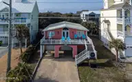 1909 S Shore Drive, Surf City, NC 28445 — 4-bedroom waterfront home in White Hills Beach, Surf City, NC, photo 2 of 55: 1-web-or-mls-DJI_0145-HDRRE